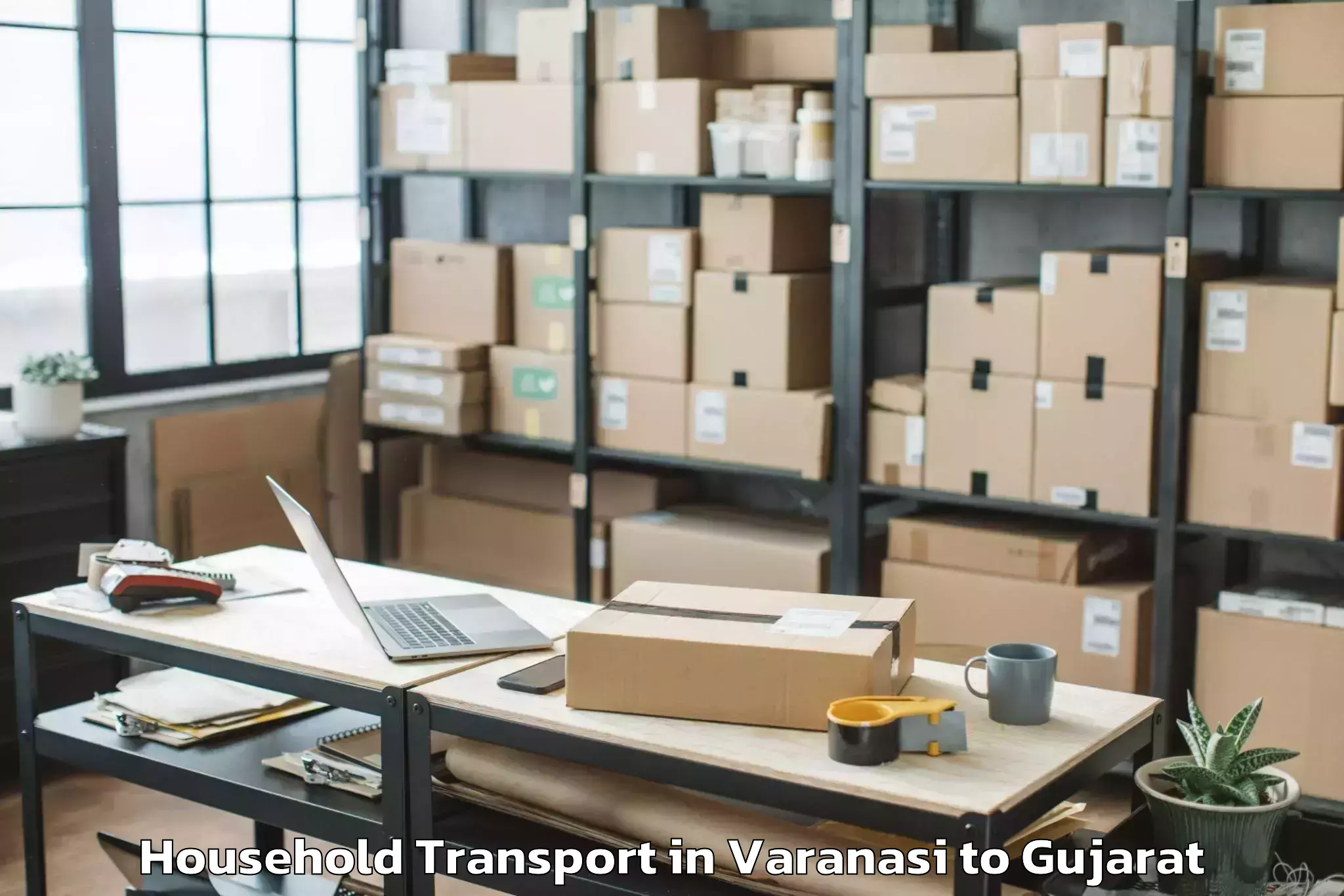 Get Varanasi to Balasinor Household Transport